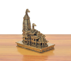 Brass ram mandir model three-quarter view with tall shikhara and side structures, 4 in