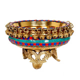 AONA elegant brass urli with teal-red beaded band, gold filigree feet and handles