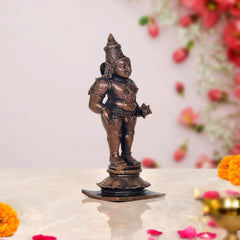 Vitthal statue, three-quarter view of standing bronze deity with crown and ornaments