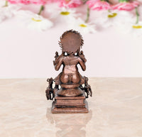 Copper Surya Dev Rath statue, rear view, ornate back hair, seven-horse base details