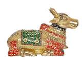 Brass Nandi statue lying-seated pose, red and green patterned body