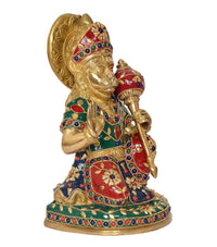 Brass Hanuman idol sitting with golden crown and red-green jeweled robe