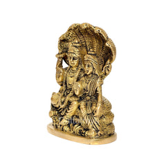 Brass Vishnu-Lakshmi idol statue seated on Sheshnag, side view