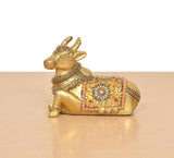 Handcrafted brass Nandi idol with Meenakari detailing, side angle, seated