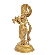 Brass Krishna idol figurine in profile, holding flute, raised halo, circular base