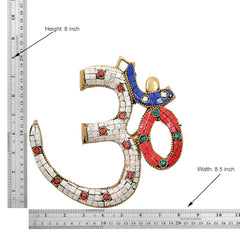 OM wall hanging sculpture with white mosaic tile face and red, blue, green gem insets