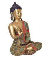 Meditating Buddha statue with joined palms mudra, brass finish and jeweled patterned robe