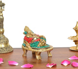 Brass Ganesha statue, side view; red and green beaded inlay on platform