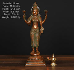 Standing brass Lakshmi murti with four lotus hands, ornate crown, on square base