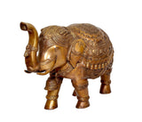 Brass elephant figurine rear-side view with ornate engraved head and raised tail