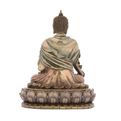 Back view of Lord Buddha resin figurine, detailed crown and draped robe