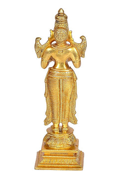 Golden brass Laxmi idol statue with ornate headdress, angled rear view