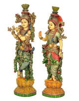 Radha-Krishna resin idol pair, side views of crowned deities with jeweled gold detailing