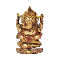 Golden resin Ganesha showpiece with multi-color details and shankh hands, seated on round base