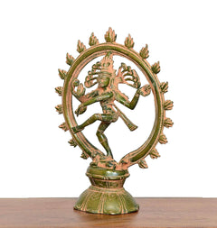 Brass Shiva Nataraj dancing figurine seen from side, circular halo ring