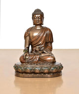Seated Buddha resin statue in gold tone, front view, detailed hands and lotus base