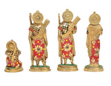Ram Darbar brass statues from the back, red patterned garments and gold motifs