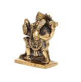 Brass Kal Bhairava idol side profile, ornate headdress and belt details on base