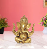 Brass Lord Ganesha sitting statue with raised hands and detailed crown, 6-inch