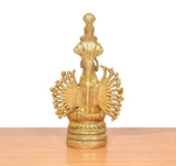 Back view of golden brass showpiece base with tall upper figure and spoked halo