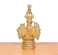 Back view of golden brass showpiece base with tall upper figure and spoked halo