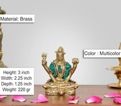 Brass Lord Bholenath sculpture, seated with teal garment and multicolor accents