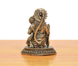 Brass Hanuman JI statue side view with flowing draped detailing, raised hand on ornate base