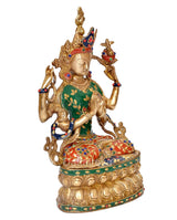 Tara Devi brass goddess idol, profile view, green dress with floral motifs, gold detailing