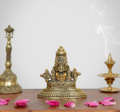 Tirupati Bala Ji brass face showpiece with detailed crown, front view on base