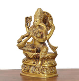 Brass Saraswati statue, close view of seated goddess holding veena and pose