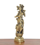 Superfine brass Radha idol, angled view, detailed layered dress and ornamental base