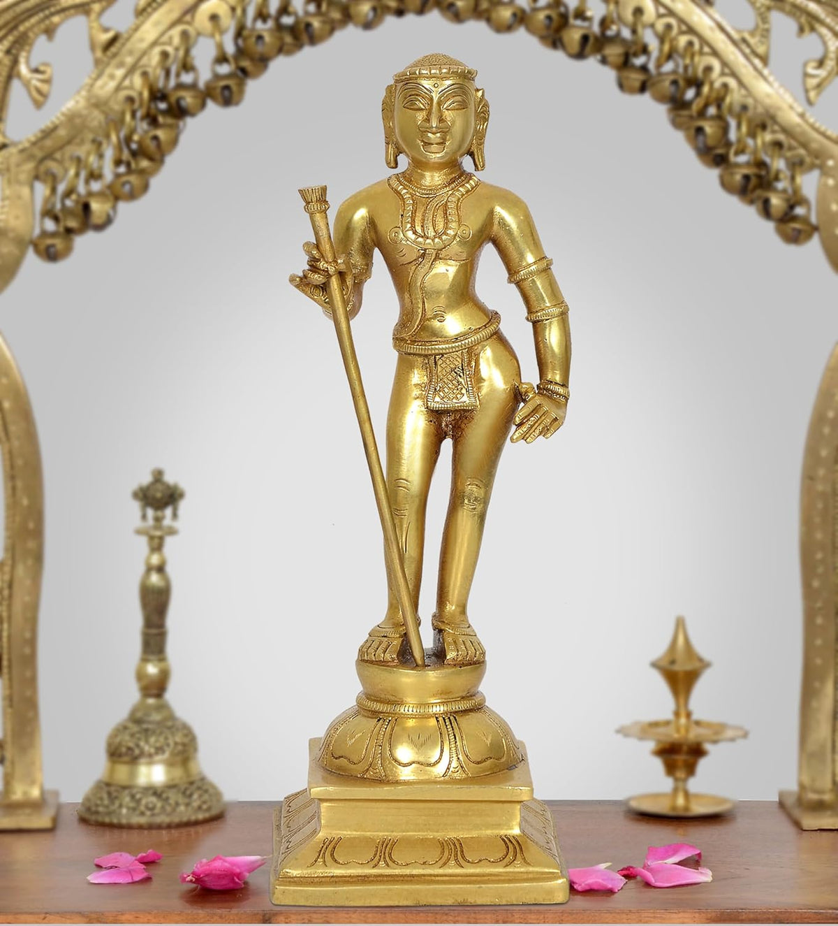 Brass standing Lord Kartikeya Murugan statue holding spear, ornamental base