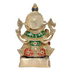 Back view of brass Ganesha statue, blue crown top, green draped ornaments, front base