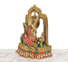 Brass Saraswati throne idol, side view, multicolor inlay, seated with veena