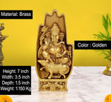 Golden brass Ganesha idol seated with blessing gesture on a mouse and ornate base.
