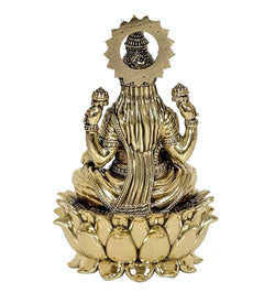Lakshmi brass idol statue viewed from behind, lotus base and detailed ornaments