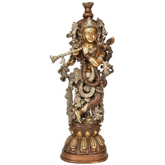 Brass standing Krishna figure with flute, ornate crown and raised hands
