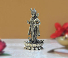 Side view brass Lord Kartikeya Murugan murti holding spear atop lotus base