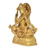 Golden brass Saraswati statue from side view, veena held diagonally, seated