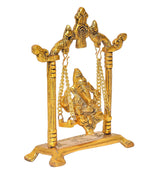 Golden Ganpati idol on swing jhula, front view with ornate base and chains
