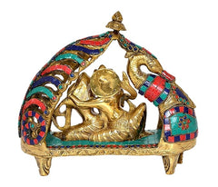 Brass Radha Krishna idol statue, angled close view of seated figures and arch