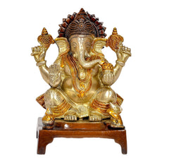 Brass Ganesha statue, front view, ornate crown and gold-toned details