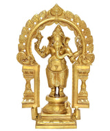 Gold-tone Ganesh statue with prabhavali arch, standing on pedestal, front view