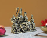 Brass Shiv Parivar idol for home decor, side view of seated family figures on base