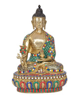 Brass meditating Buddha idol in Dhyan mudra, multicolor jeweled robe, ornate base