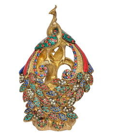 Gold brass peacock figure with jeweled red, blue, and green inlaid pattern