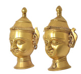 Brass Shiva Gauri head wall hanging, close-up of engraved eyes and forehead mark