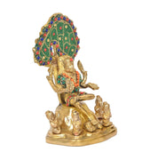 Brass Dakshinamurti Shiva statue in meditating pose, multicolor jeweled halo, standing attendants