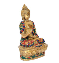Brass meditating Buddha statue with palms together, jeweled robe, lotus base