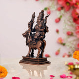 Copper Shiva-Parvati on Nandi idol, side view with trident
